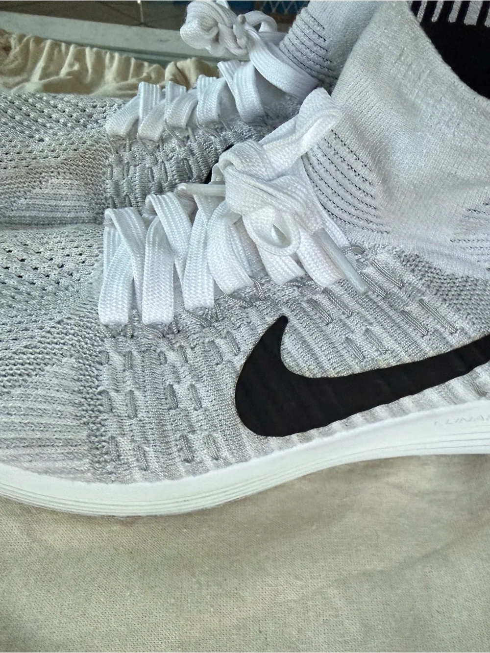 Nike Women’s Lunarepic White and Black Flyknit running Sneakers